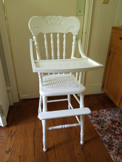 white and wood high chair